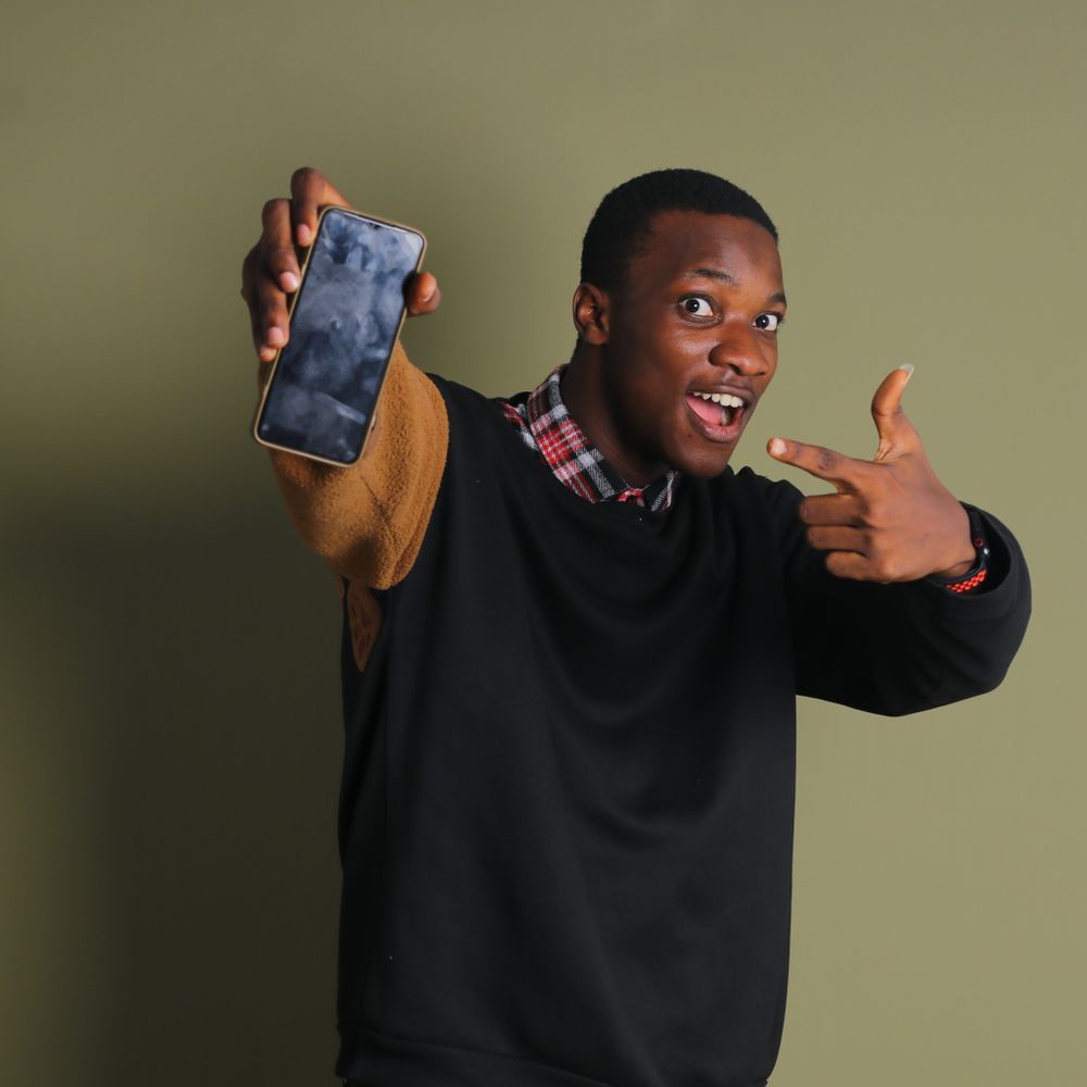 Customer showing bills paid on his phone